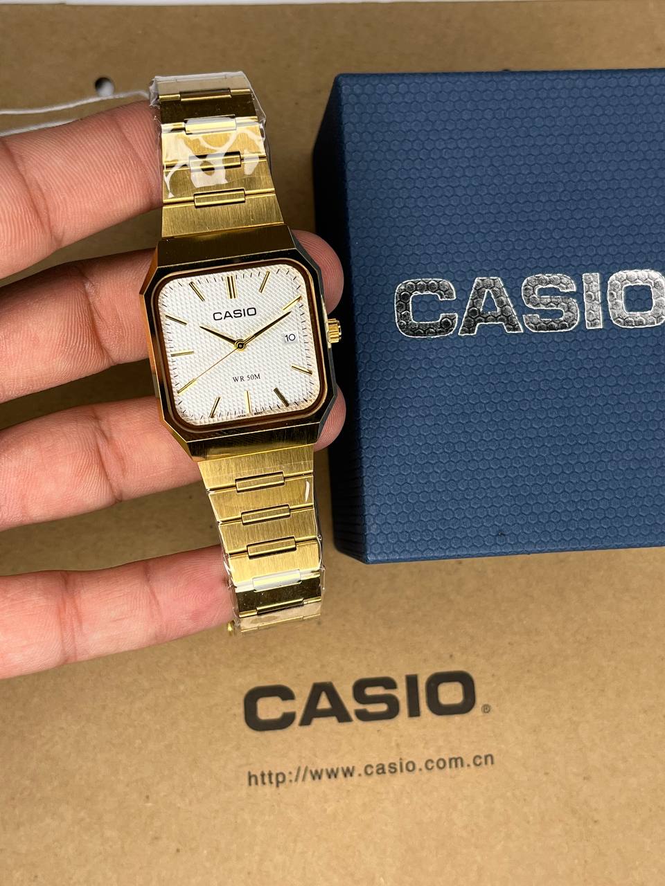 ساعت کاسیو مردانه طلایی صفحه سفید Casio AMW-B185
